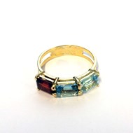 BESPOKE AQUAMARINE TOPAZ AND GARNET RING