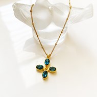 SANTORINI BLUE TOPAZ DAISY CROSS IN 18ct GOLD