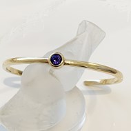 9ct TORQ BANGLE WITH TANZANITE