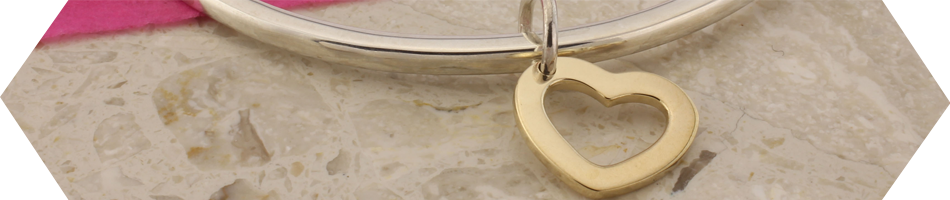 Bracelets and bangles in silver and gold many with gemstones by Argent of London